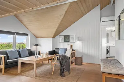 a living room with a couch and a table at 382-Thisted-Kristinesvej-2 in Thisted