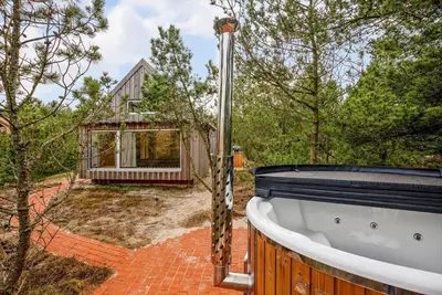 a bath tub sitting on top of a house at 1061-Thisted-Spanggardsvej-85-B in Torsted