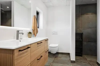 a bathroom with a sink and a toilet at 1068-Thisted-Klovborgsti-5-A in Torsted