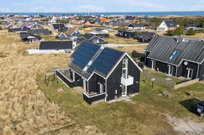an aerial view of a home with a solar roof at 1356-Thisted-Nordsovej-106 in Thisted