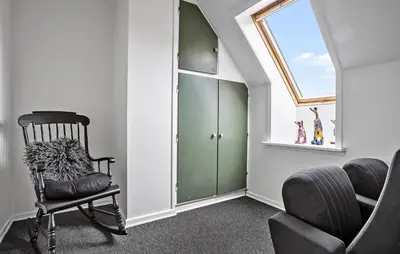 a living room with a chair and a window at Pet Friendly Home In Spøttrup With Wifi in Spottrup