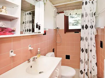 a bathroom with a sink and a toilet at 6 person holiday home in Vinderup-By Traum in Vinderup