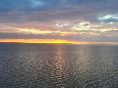 a sunset over a large body of water at 6 person holiday home in Vinderup-By Traum in Vinderup
