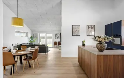 a living room with a table and a dining room at Gorgeous Home In Saltum With Wifi in Saltum