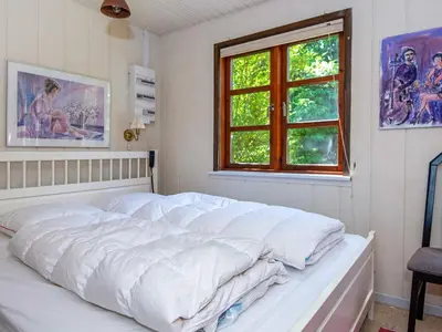 a white bed in a room with a window at 6 person holiday home in Højslev-By Traum in Højslev