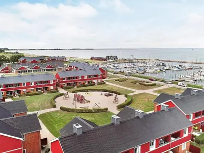 an aerial view of a marina with boats in the water at 4-person cabin in Lemvig holiday park in Lemvig