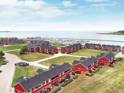 an aerial view of a building near the water at 4-person cabin in Lemvig holiday park in Lemvig