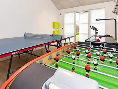 a room with ping pong balls on a table at 8 person holiday home in Brovst-By Traum in Brovst
