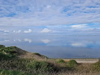 a large body of water with clouds in the sky at 12 person holiday home in Vestervig-By Traum in Vestervig