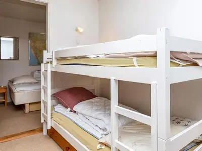 a bunk bed room with two bunk beds at 6 person holiday home in Thyholm-By Traum in Thyholm