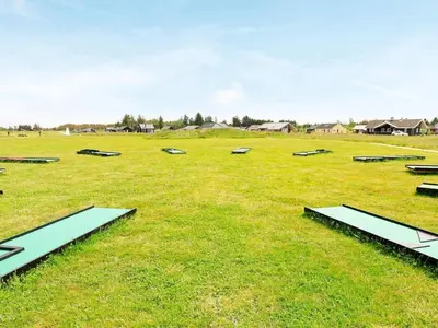 a field with rows ofogie boards in the grass at 16 person holiday home in Brovst-By Traum in Brovst