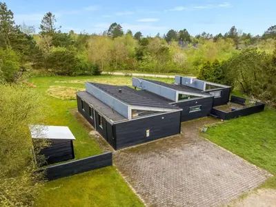 an overhead view of three houses in a field at Holiday Home Ginne - 1km to the fjord by Interhome in Løgstør