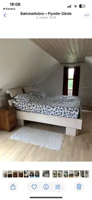 a bedroom with a bed in a room at Stor lejlighed i landlige omgivelser in Bækmarksbro
