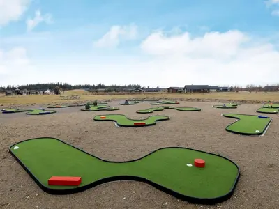 a group of miniature golf courses in a field at 10 person holiday home in Brovst-By Traum in Brovst