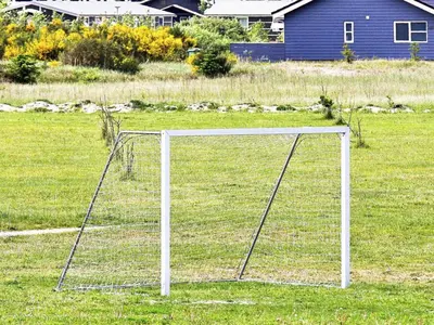 a soccer goal in the middle of a field at 10 person holiday home in Brovst-By Traum in Brovst
