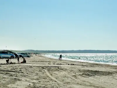 a group of people standing on the beach at 10 person holiday home in Brovst-By Traum in Brovst