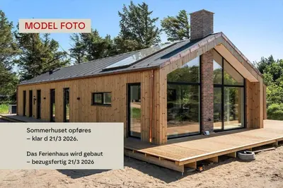a tiny house with a roof on a deck at 810-Harboore-Vejlby-Klit-6-D in Harboør