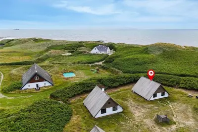 a group of houses on a small island in the ocean at 531-Lemvig-Lokkevej-59-C in Lemvig