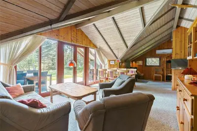 a living room with couches and a table at LK473-Lokken-Kettrup-Bjerge-Vej-47 in Løkken