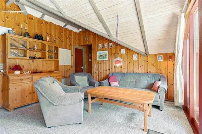 a living room with two couches and a coffee table at LK473-Lokken-Kettrup-Bjerge-Vej-47 in Løkken