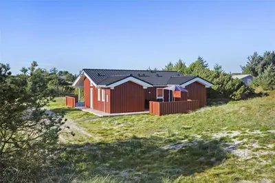 a house on the side of a hill at LK1423-Lokken-Rikkesvej-4 in Løkken