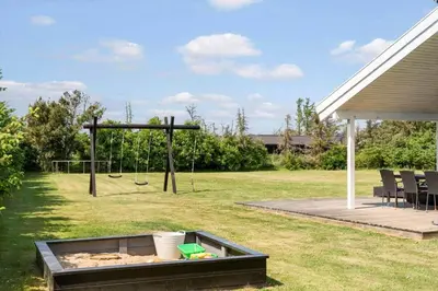 a park with a playground with a swing at LK780-Lokken-Margrethevej-4 in Løkken