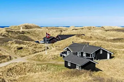a group of houses on top of a hill at LK322-Lokken-Ornegaardsvej-27 in Løkken