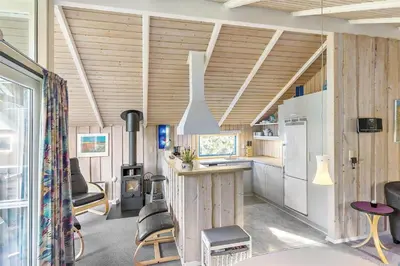 a kitchen and living room in a tiny house at LK1641-Lokken-Karinavej-3 in Løkken