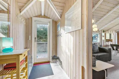a tiny house with a living room and a desk at LK1641-Lokken-Karinavej-3 in Løkken