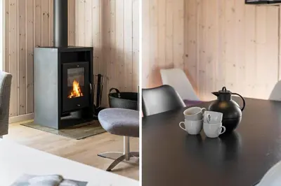 two pictures of a table with a stove in a room at LK167-Lokken-Kringelbaekvej-43 in Løkken