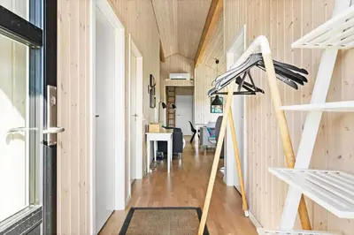 a hallway of a house with wooden walls at LK167-Lokken-Kringelbaekvej-43 in Løkken