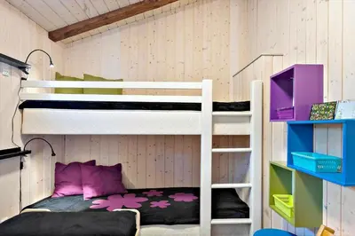 a bunk bed room with two bunk beds in it at LK741-Lokken-Madsinesvej-1 in Løkken