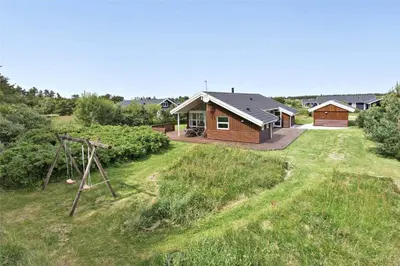 an aerial view of a house with a yard at LK862-Lokken-Olgavej-49 in Løkken