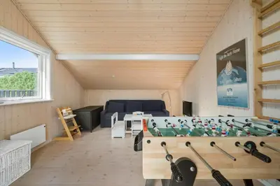 a room with a room with hockey equipment in it at LK2065-Lokken-Rikkesvej-5 in Løkken