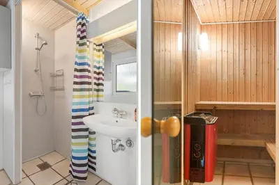 a bathroom with a sink and a toilet and a shower at LK2084-Lokken-Margrethevej-76 in Løkken