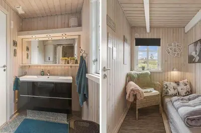 a small bathroom with a sink and a mirror at LK2029-Lokken-Magdalenevej-55 in Løkken