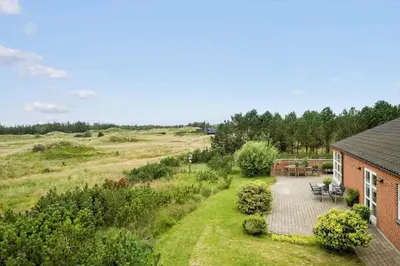 an aerial view of a house with a garden at BL1220-Blokhus-Peter-Andersensvej-21 in Blokhus