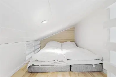 a bed in a room with white walls at BL1642-Saltum-Bondagervej-50 in Saltum