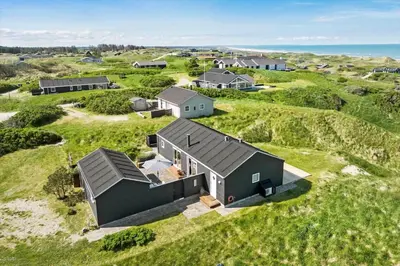 an overhead view of a house on a grassy field at LK553-Lokken-Rosavej-7 in Løkken