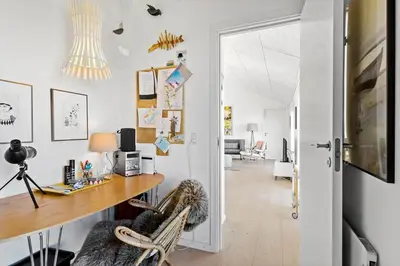a home office with a desk and a chair at LK553-Lokken-Rosavej-7 in Løkken
