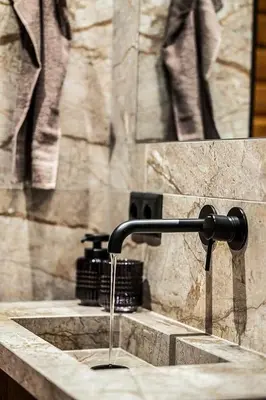 a sink with a water faucet on a stone counter at BL1224-Saltum-Vikingebanke-7 in Saltum