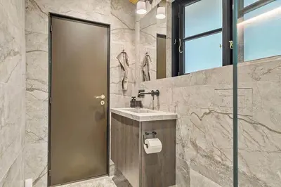 a bathroom with a sink and a mirror at BL1224-Saltum-Vikingebanke-7 in Saltum