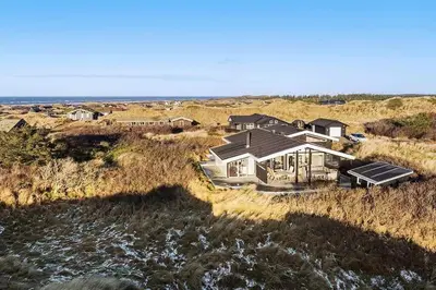 an aerial view of a house on the beach at BL1265-Saltum-Faaborgvej-7 in Saltum