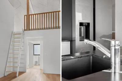 a kitchen with a sink and a stair case at LK2143-Lokken-Kringelbaekvej-29 in Løkken