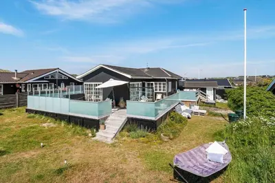a house with a large yard with a house at BL1637-Blokhus-Norresundbyvej-2 in Blokhus