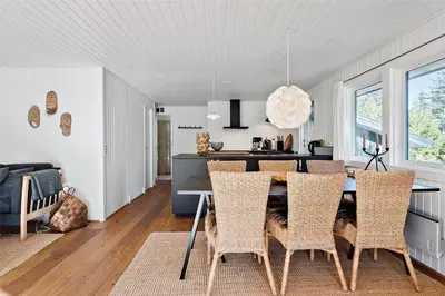 a kitchen and dining room with a table and chairs at BL1716-Saltum-Viborgvej-2 in Saltum