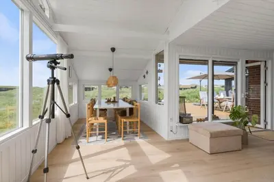 a camera on a tripod in a room with a table at BL1020-Pandrup-Hunetorp-Klitvej-257 in Pandrup