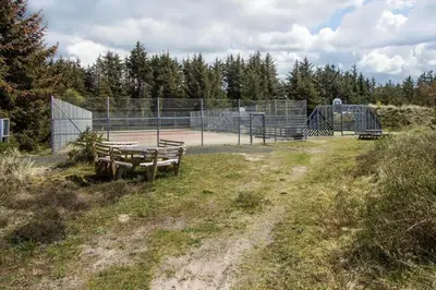 a park with a picnic table and a playground at BL1401-Blokhus-Ferren-Syd-78 in Blokhus