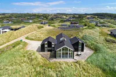 an overhead view of a house on a grassy hill at BL247-Saltum-Haresvinget-9 in Saltum