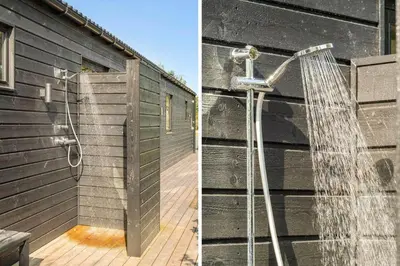 a shower with a hose attached to a building at BL1485-Blokhus-Jaegervaenget-2-A in Blokhus